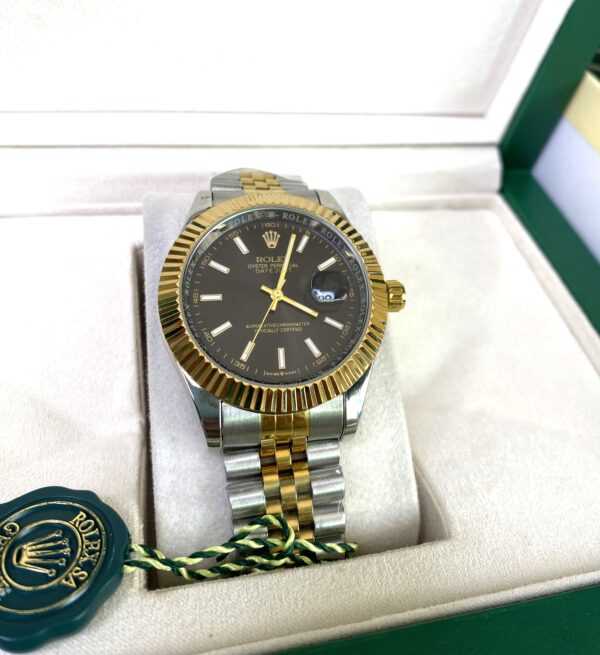 Rolex date just 40  noir cadran jaune