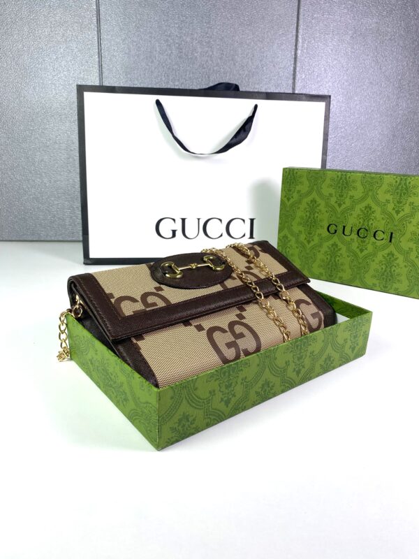 Sac pochette Gucci bandoulière en metal